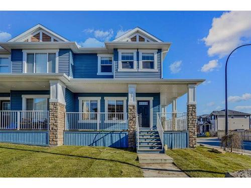 29 Willow Mews, Cochrane, AB - Outdoor With Deck Patio Veranda With Facade