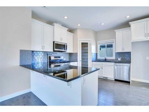 29 Willow Mews, Cochrane, AB - Indoor Photo Showing Kitchen With Upgraded Kitchen