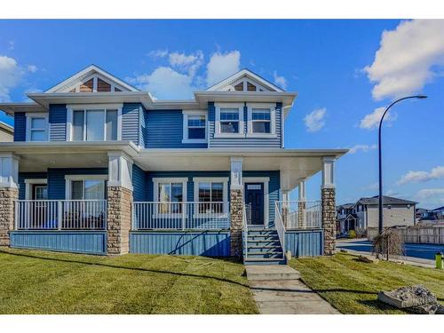 29 Willow Mews, Cochrane, AB - Outdoor With Deck Patio Veranda With Facade