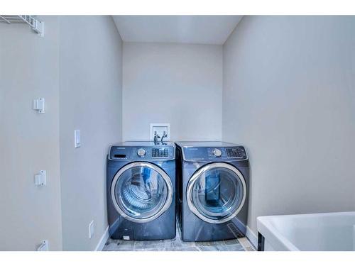 29 Willow Mews, Cochrane, AB - Indoor Photo Showing Laundry Room