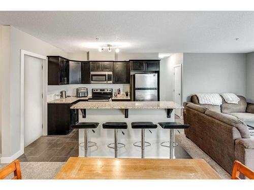 107-117 19 Avenue Ne, Calgary, AB - Indoor Photo Showing Kitchen With Stainless Steel Kitchen