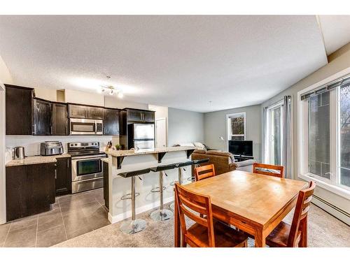 107-117 19 Avenue Ne, Calgary, AB - Indoor Photo Showing Kitchen