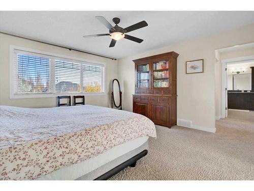 7 Cimarron Estates Manor, Okotoks, AB - Indoor Photo Showing Bedroom