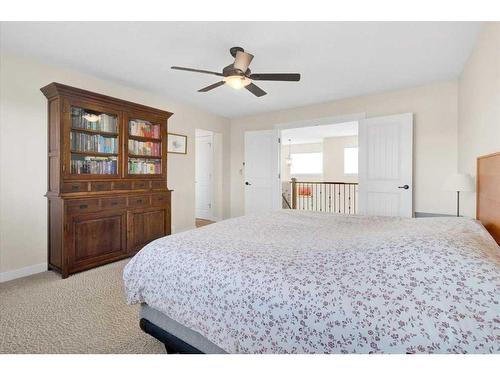 7 Cimarron Estates Manor, Okotoks, AB - Indoor Photo Showing Bedroom