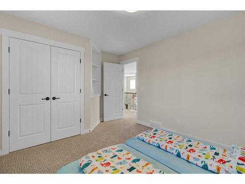 7 Cimarron Estates Manor, Okotoks, AB - Indoor Photo Showing Bedroom