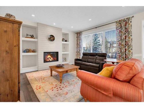 7 Cimarron Estates Manor, Okotoks, AB - Indoor Photo Showing Living Room With Fireplace