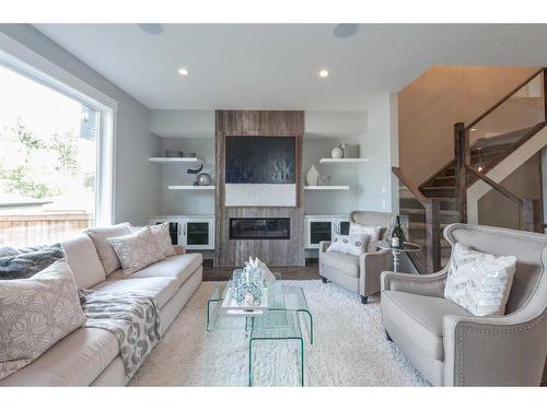 180 Lakewood Circle, Strathmore, AB - Indoor Photo Showing Living Room With Fireplace