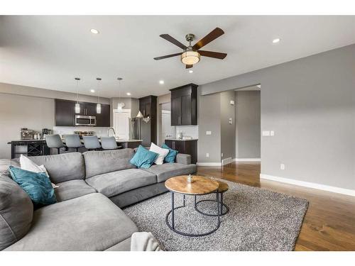 208 Rainbow Falls Green, Chestermere, AB - Indoor Photo Showing Living Room