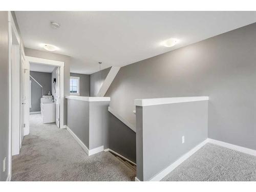 208 Rainbow Falls Green, Chestermere, AB - Indoor Photo Showing Other Room