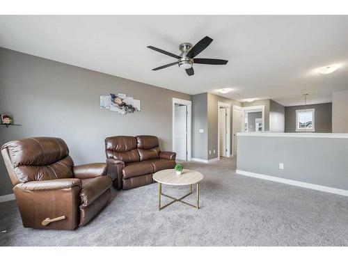 208 Rainbow Falls Green, Chestermere, AB - Indoor Photo Showing Living Room