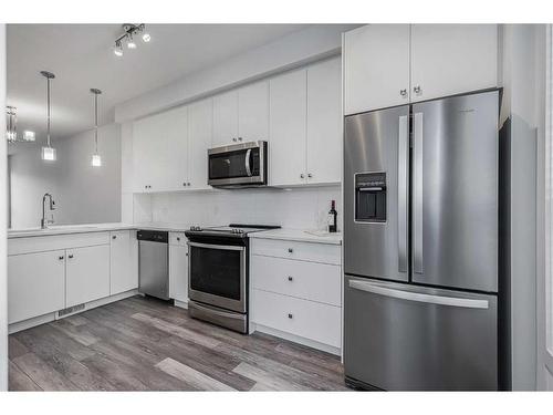 604-15 Evanscrest Park Nw, Calgary, AB - Indoor Photo Showing Kitchen With Stainless Steel Kitchen With Upgraded Kitchen