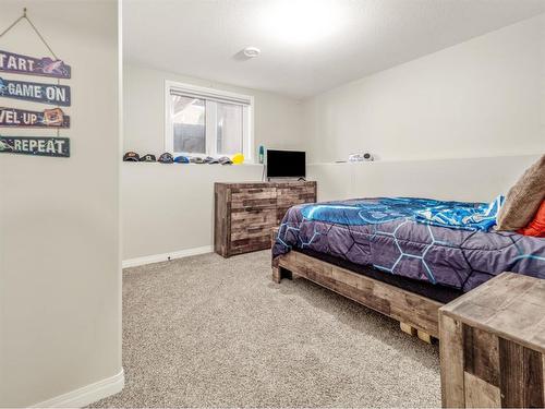 5 Prairie Lake Court, Taber, AB - Indoor Photo Showing Bedroom