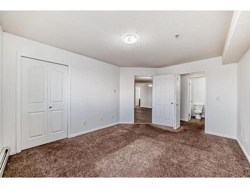 2126-10 Prestwick Bay Se, Calgary, AB - Indoor Photo Showing Other Room