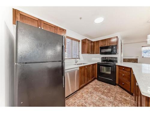 2126-10 Prestwick Bay Se, Calgary, AB - Indoor Photo Showing Kitchen