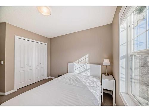 28 Auburn Bay Crescent Se, Calgary, AB - Indoor Photo Showing Bedroom