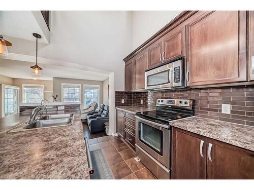 28 Auburn Bay Crescent Se, Calgary, AB - Indoor Photo Showing Kitchen With Double Sink With Upgraded Kitchen