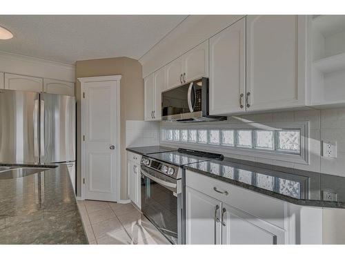 238 Chaparral Court Se, Calgary, AB - Indoor Photo Showing Kitchen With Upgraded Kitchen