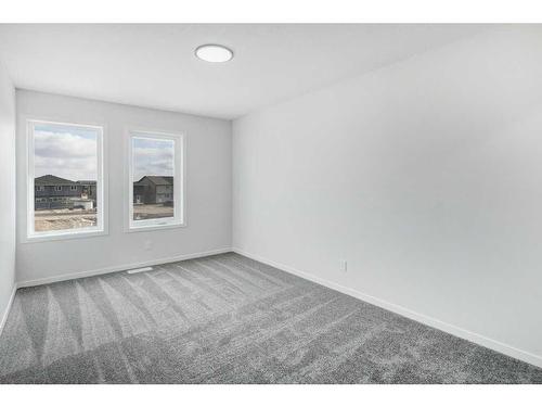 67 Corner Glen Common Ne, Calgary, AB - Indoor Photo Showing Other Room