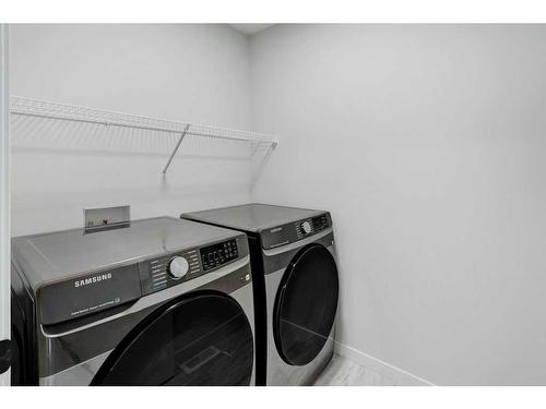 67 Corner Glen Common Ne, Calgary, AB - Indoor Photo Showing Laundry Room