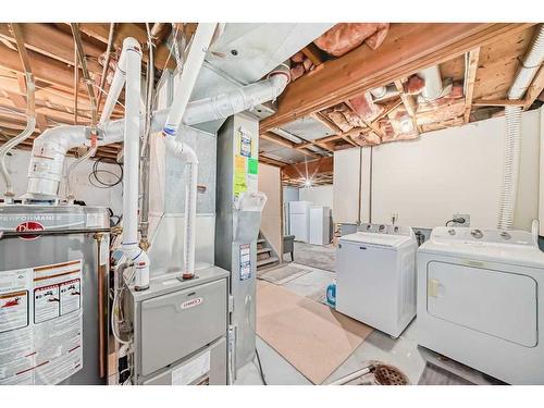 19-4360 58 Street Ne, Calgary, AB - Indoor Photo Showing Laundry Room