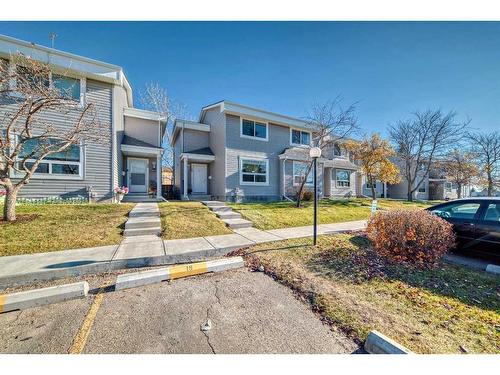 19-4360 58 Street Ne, Calgary, AB - Outdoor With Facade