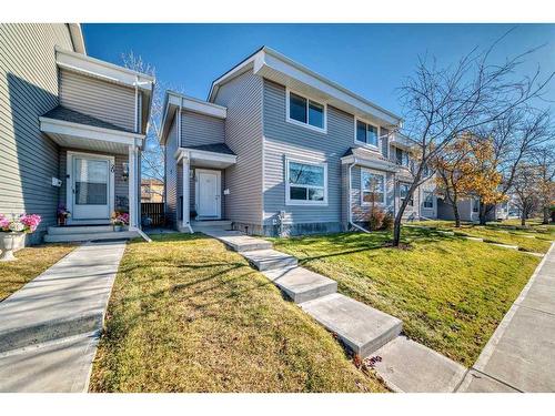 19-4360 58 Street Ne, Calgary, AB - Outdoor With Facade