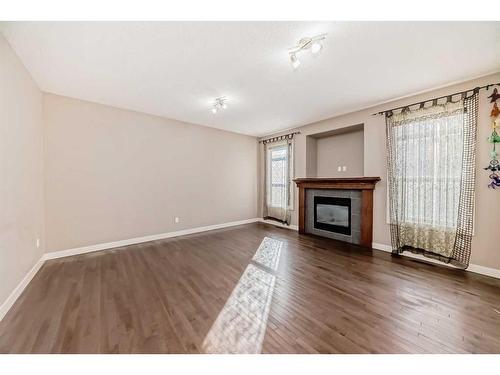 162 Sherwood Hill Nw, Calgary, AB - Indoor Photo Showing Living Room With Fireplace