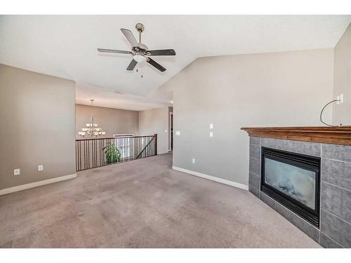 162 Sherwood Hill Nw, Calgary, AB - Indoor Photo Showing Other Room With Fireplace