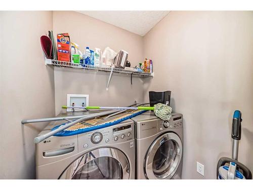 162 Sherwood Hill Nw, Calgary, AB - Indoor Photo Showing Laundry Room