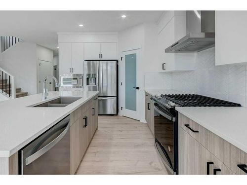 370 Corner Glen Way Ne, Calgary, AB - Indoor Photo Showing Kitchen With Double Sink With Upgraded Kitchen