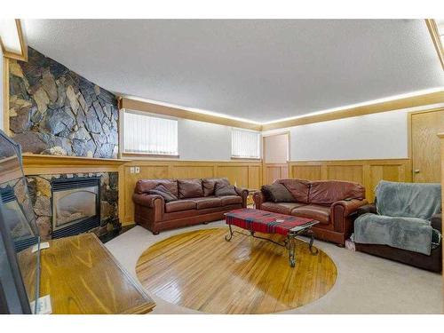 1211 Bantry Street Ne, Calgary, AB - Indoor Photo Showing Living Room With Fireplace