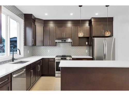 5224 21 Street Sw, Calgary, AB - Indoor Photo Showing Kitchen With Stainless Steel Kitchen With Double Sink With Upgraded Kitchen