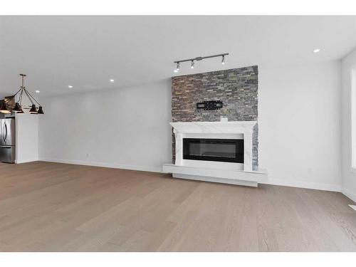 5224 21 Street Sw, Calgary, AB - Indoor Photo Showing Living Room With Fireplace