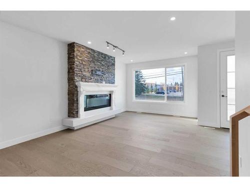 5224 21 Street Sw, Calgary, AB - Indoor Photo Showing Living Room With Fireplace