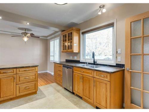 7 Culver Road Nw, Calgary, AB - Indoor Photo Showing Kitchen With Double Sink