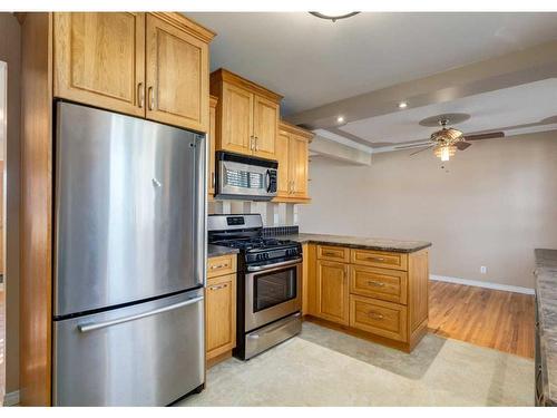 7 Culver Road Nw, Calgary, AB - Indoor Photo Showing Kitchen With Stainless Steel Kitchen