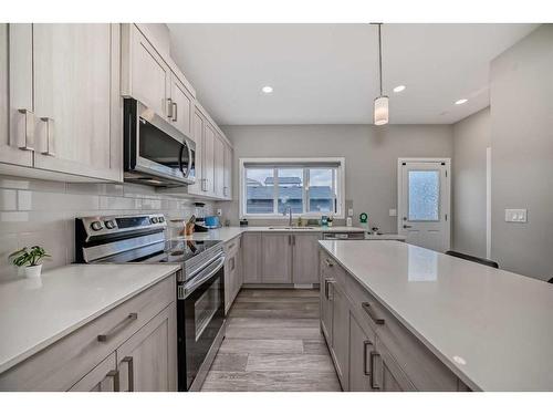 119 Creekstone Drive Sw, Calgary, AB - Indoor Photo Showing Kitchen With Upgraded Kitchen