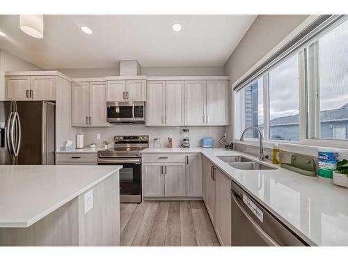 119 Creekstone Drive Sw, Calgary, AB - Indoor Photo Showing Kitchen With Stainless Steel Kitchen With Double Sink