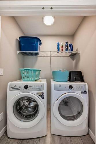 119 Creekstone Drive Sw, Calgary, AB - Indoor Photo Showing Laundry Room