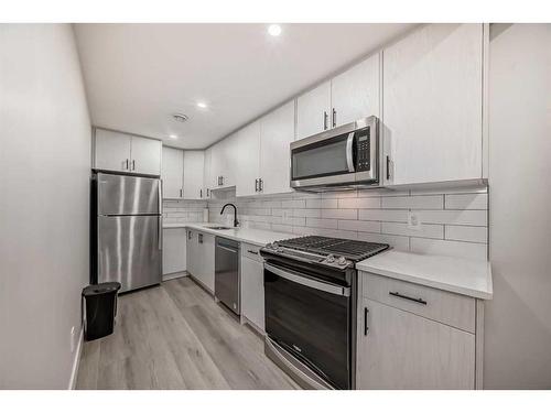 119 Creekstone Drive Sw, Calgary, AB - Indoor Photo Showing Kitchen With Stainless Steel Kitchen With Upgraded Kitchen