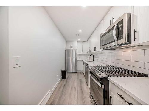 119 Creekstone Drive Sw, Calgary, AB - Indoor Photo Showing Kitchen With Stainless Steel Kitchen With Upgraded Kitchen