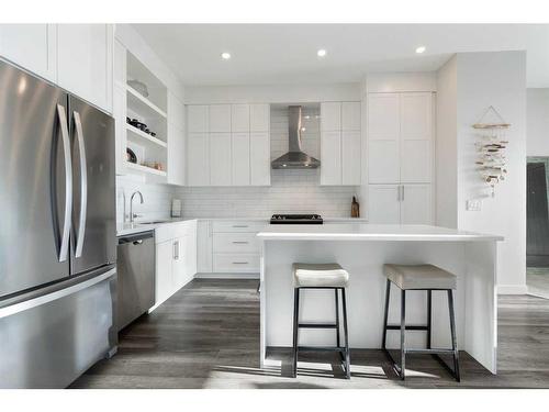 16 D'Arcy Boulevard, Okotoks, AB - Indoor Photo Showing Kitchen With Stainless Steel Kitchen With Upgraded Kitchen