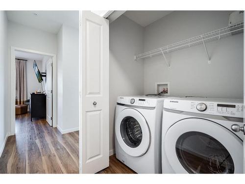 1101-19489 Main Street Se, Calgary, AB - Indoor Photo Showing Laundry Room