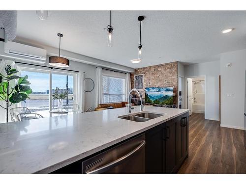 1101-19489 Main Street Se, Calgary, AB - Indoor Photo Showing Kitchen With Double Sink