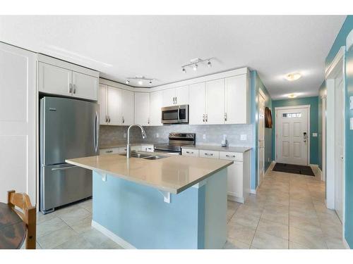 13 Chaparral Valley Gardens Se, Calgary, AB - Indoor Photo Showing Kitchen With Stainless Steel Kitchen With Double Sink