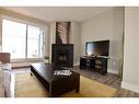 9108-315 Southampton Drive Sw, Calgary, AB  - Indoor Photo Showing Living Room With Fireplace 