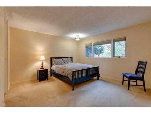 1036 Cannock Place Sw, Calgary, AB - Indoor Photo Showing Bedroom