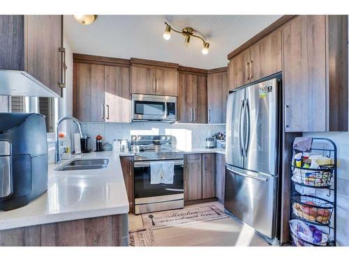 164 Martinwood Way Ne, Calgary, AB - Indoor Photo Showing Kitchen With Double Sink