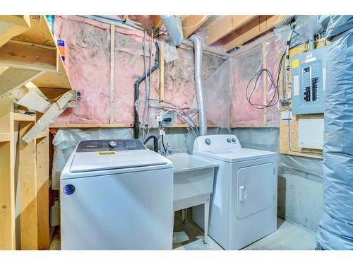 164 Martinwood Way Ne, Calgary, AB - Indoor Photo Showing Laundry Room