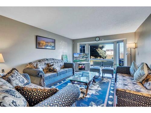 164 Martinwood Way Ne, Calgary, AB - Indoor Photo Showing Living Room